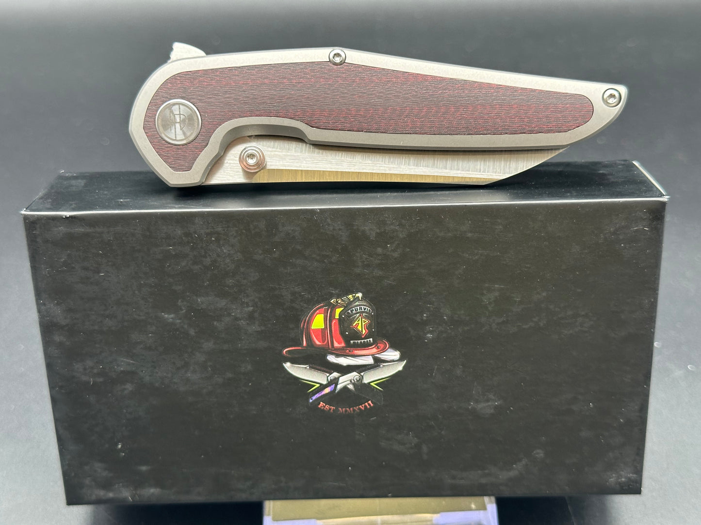 A Purvis Progeny V3 Satin/Red-Black Carbon Fiber inlays