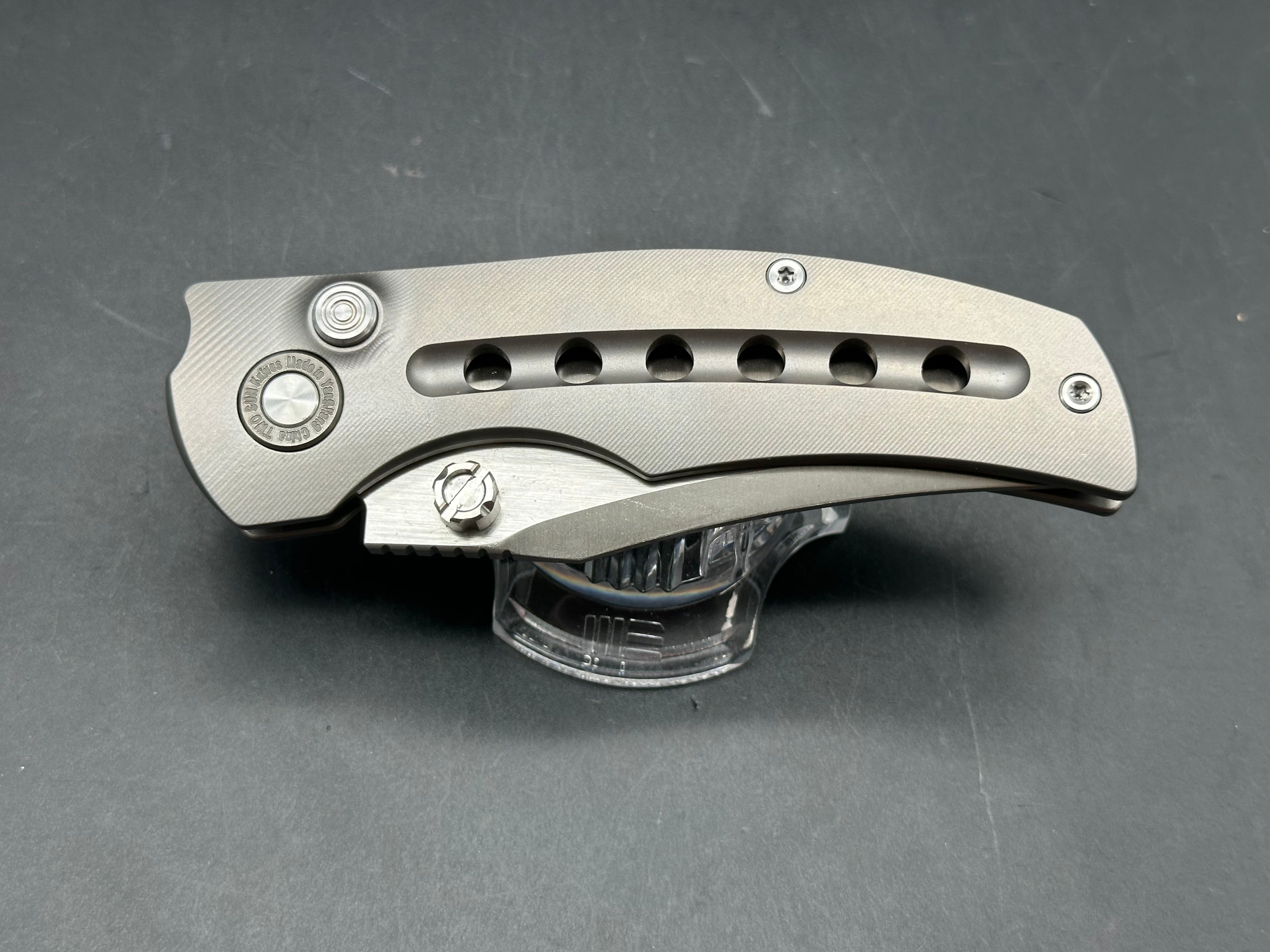 TwoSun TS313 / 3.375 inch Bohler M390 blade. Titanium handle. Button lock