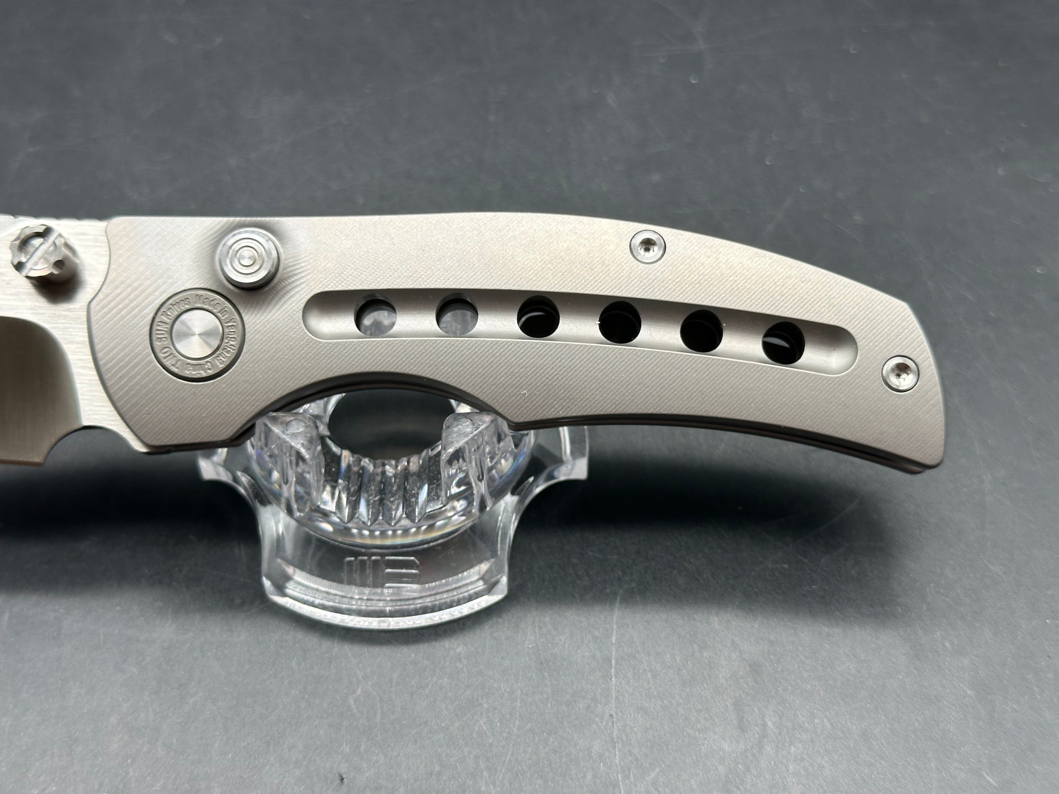 TwoSun TS313 / 3.375 inch Bohler M390 blade. Titanium handle. Button lock