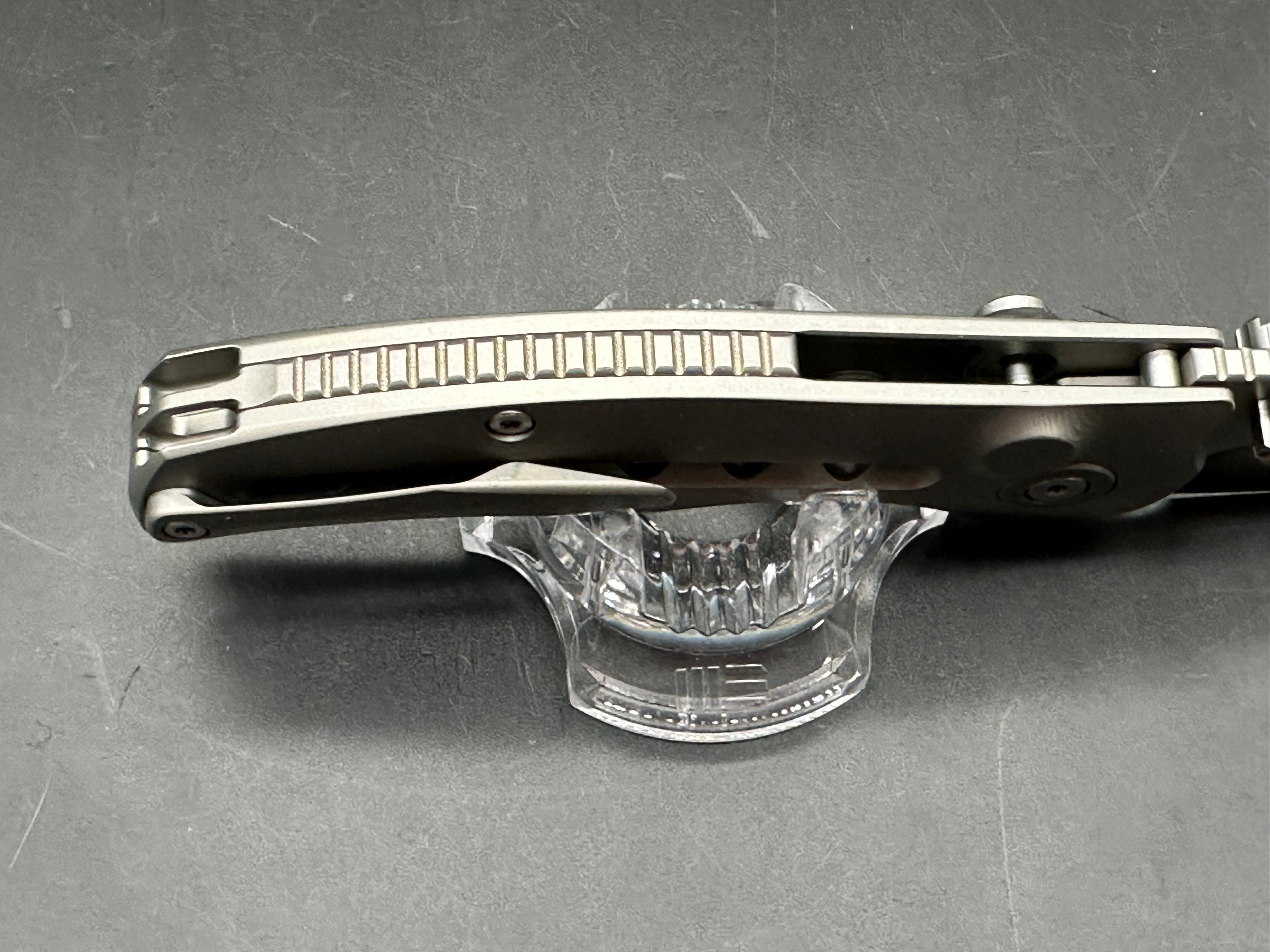 TwoSun TS313 / 3.375 inch Bohler M390 blade. Titanium handle. Button lock
