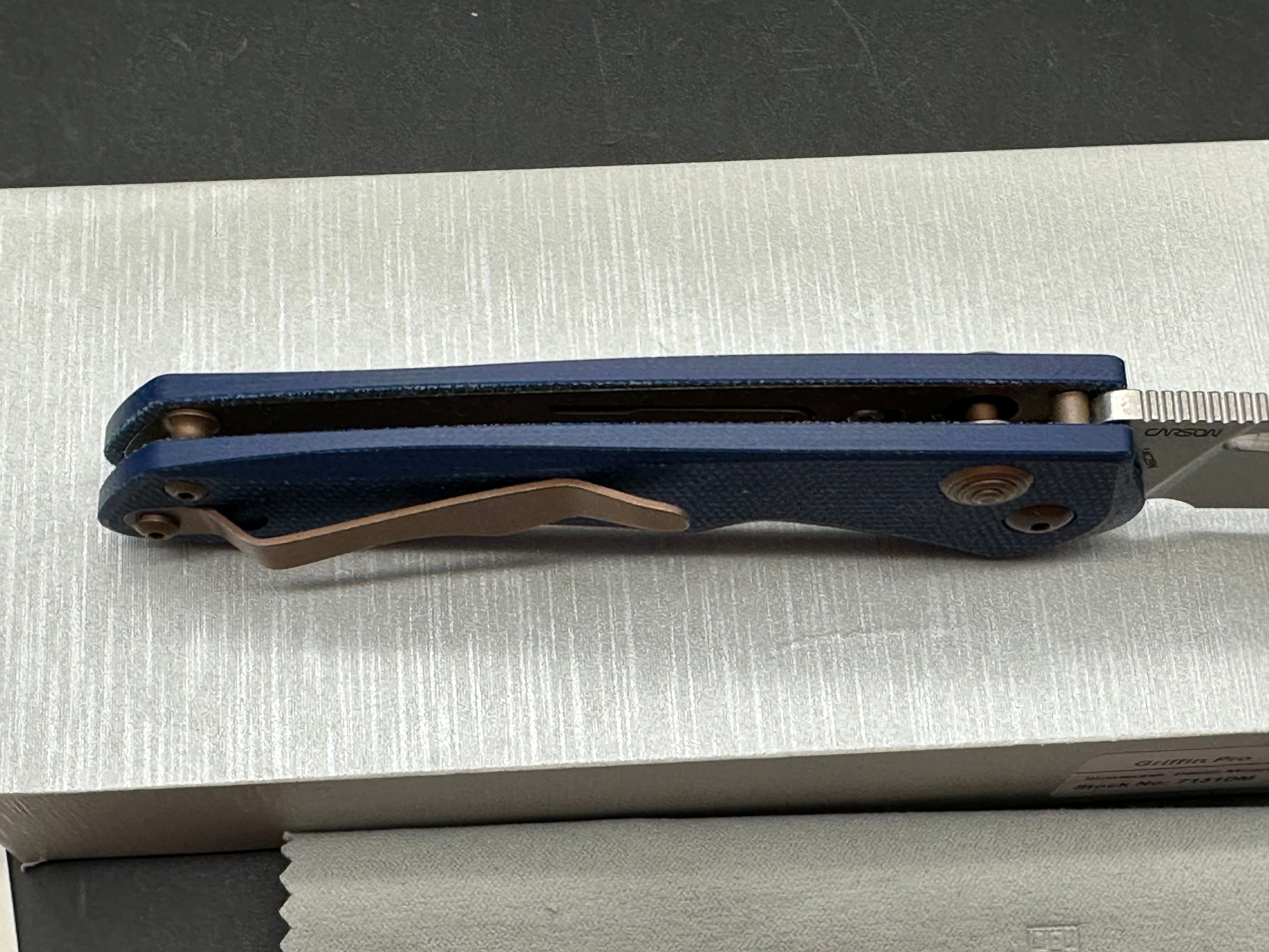 Real Steel Griffin Pro blue denim handle button lock 14C28N blade