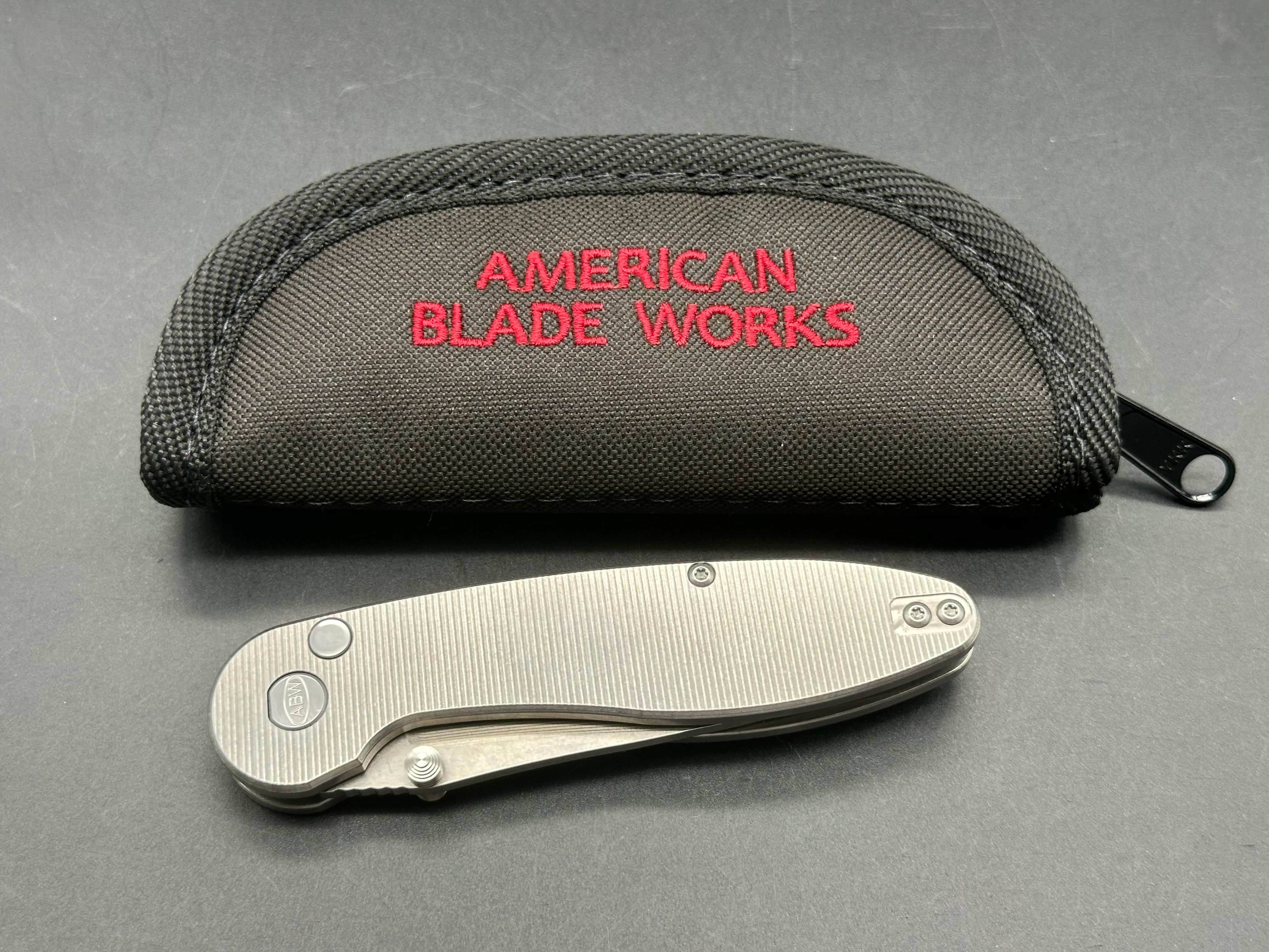 American Blade Works ABW MODEL 1 BUTTON LOCK TITANIUM Magnacut