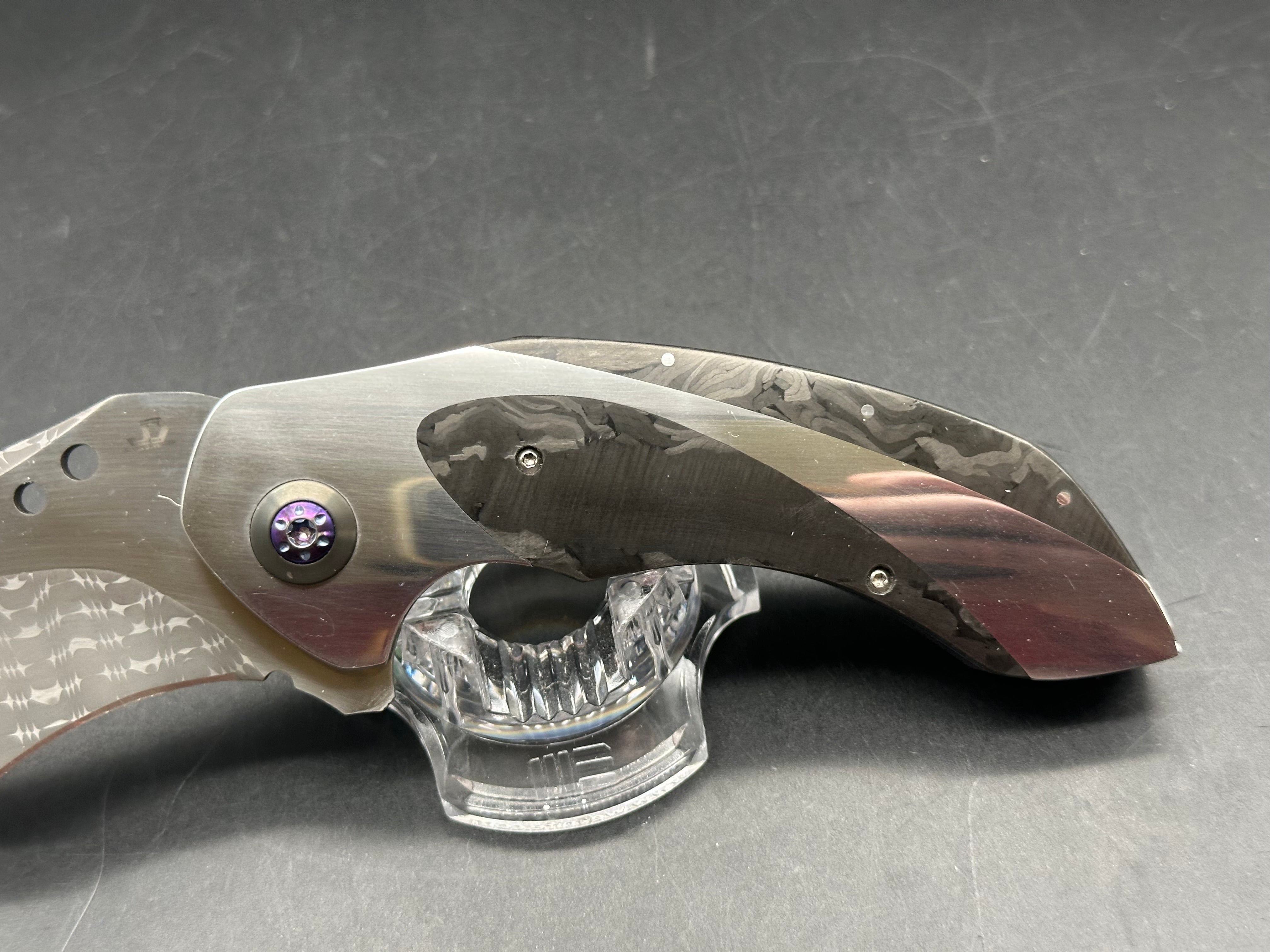 JD Vandeventer Sympatico: 3.75 inch Damascus blade with mirror polished flats. Handle with mirror polished titanium scales