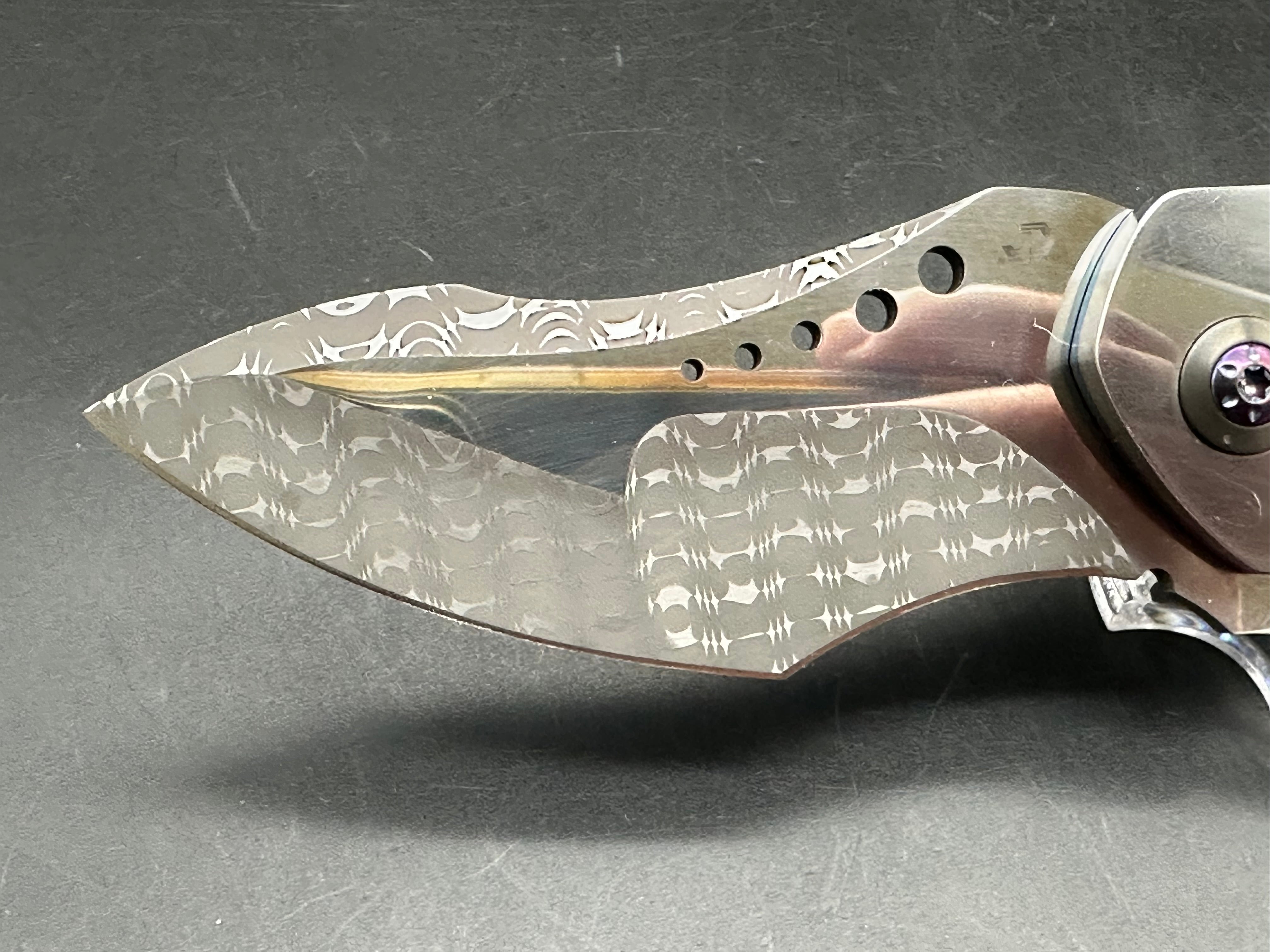JD Vandeventer Sympatico: 3.75 inch Damascus blade with mirror polished flats. Handle with mirror polished titanium scales