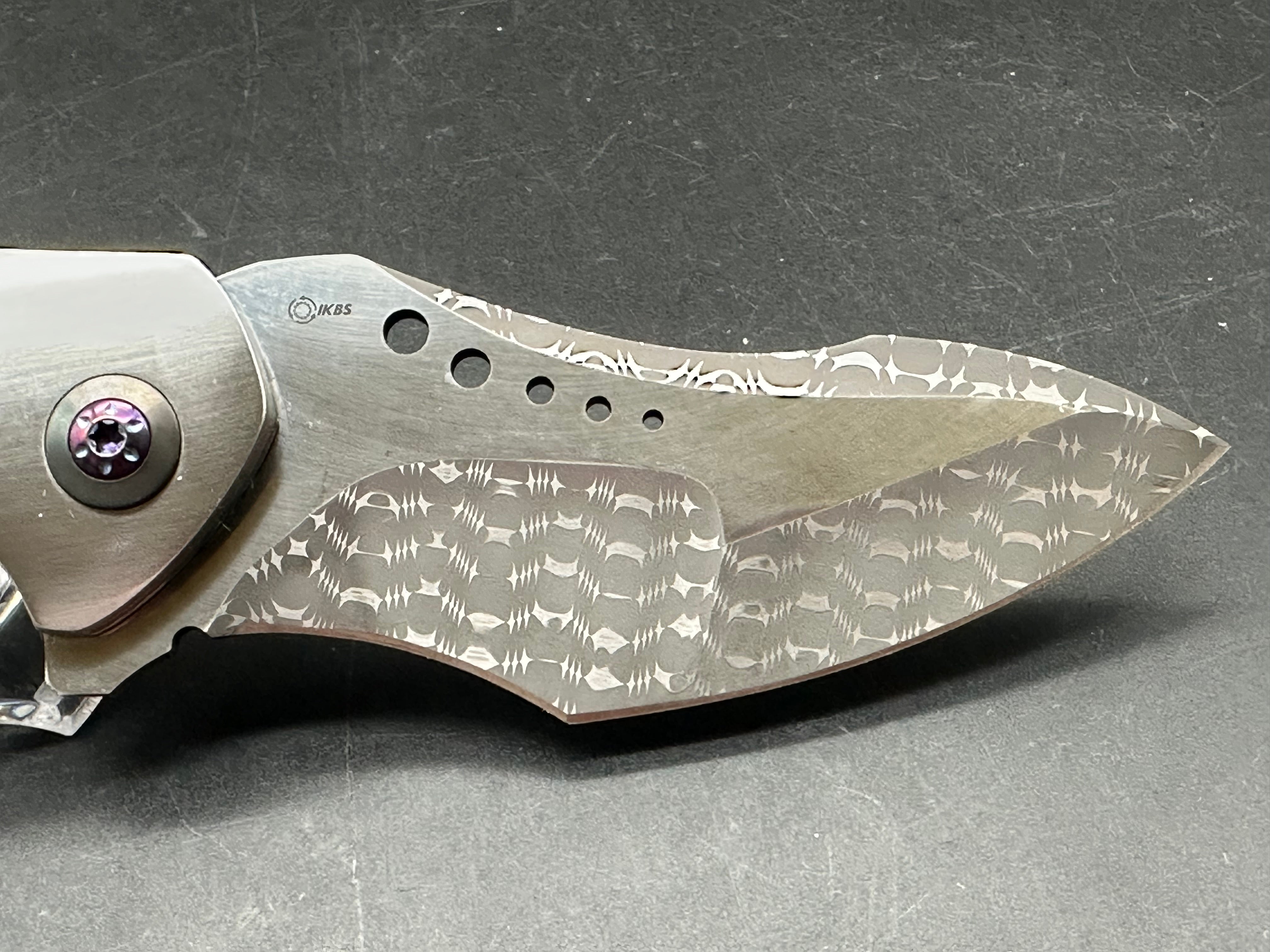 JD Vandeventer Sympatico: 3.75 inch Damascus blade with mirror polished flats. Handle with mirror polished titanium scales