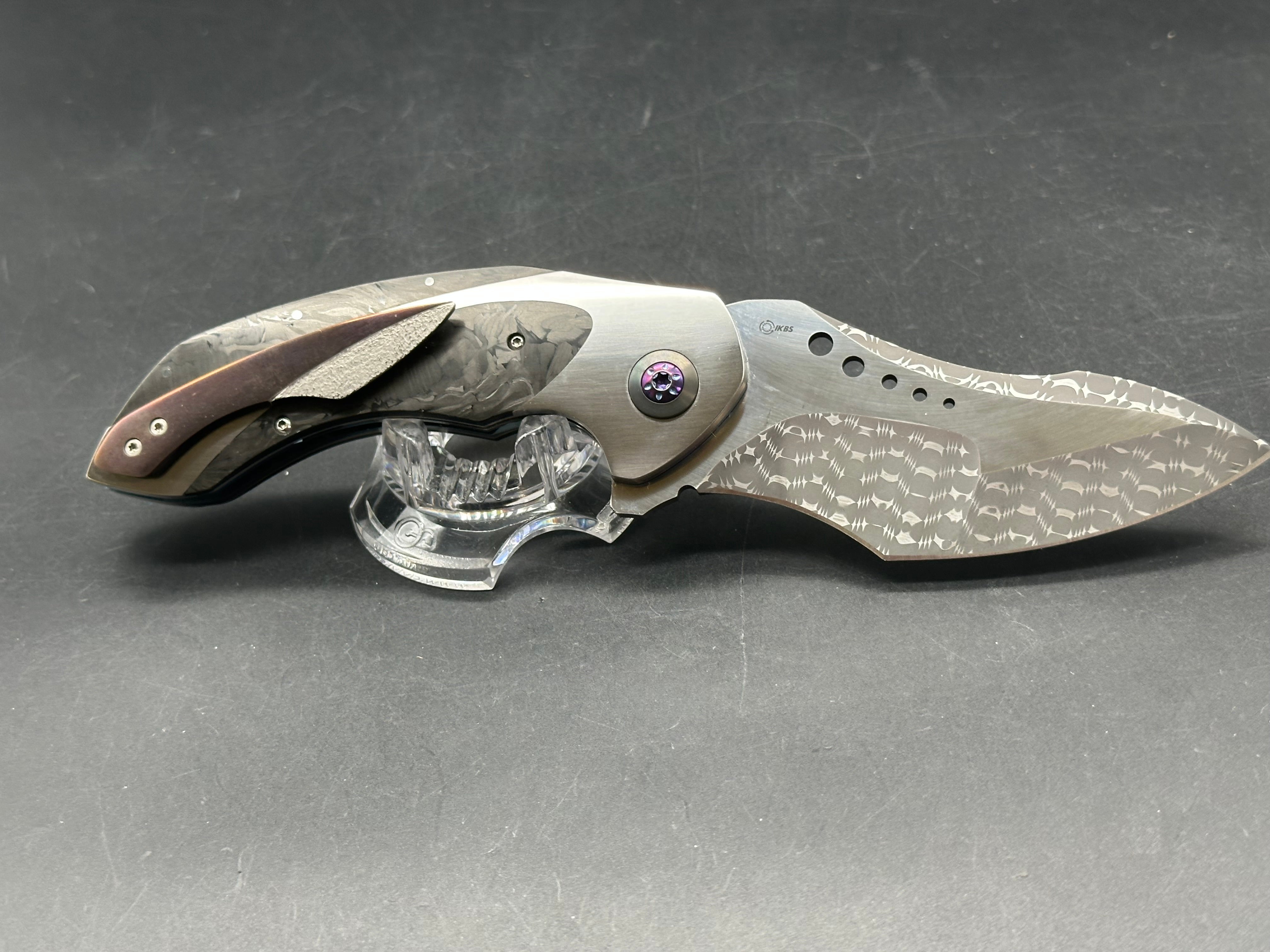 JD Vandeventer Sympatico: 3.75 inch Damascus blade with mirror polished flats. Handle with mirror polished titanium scales