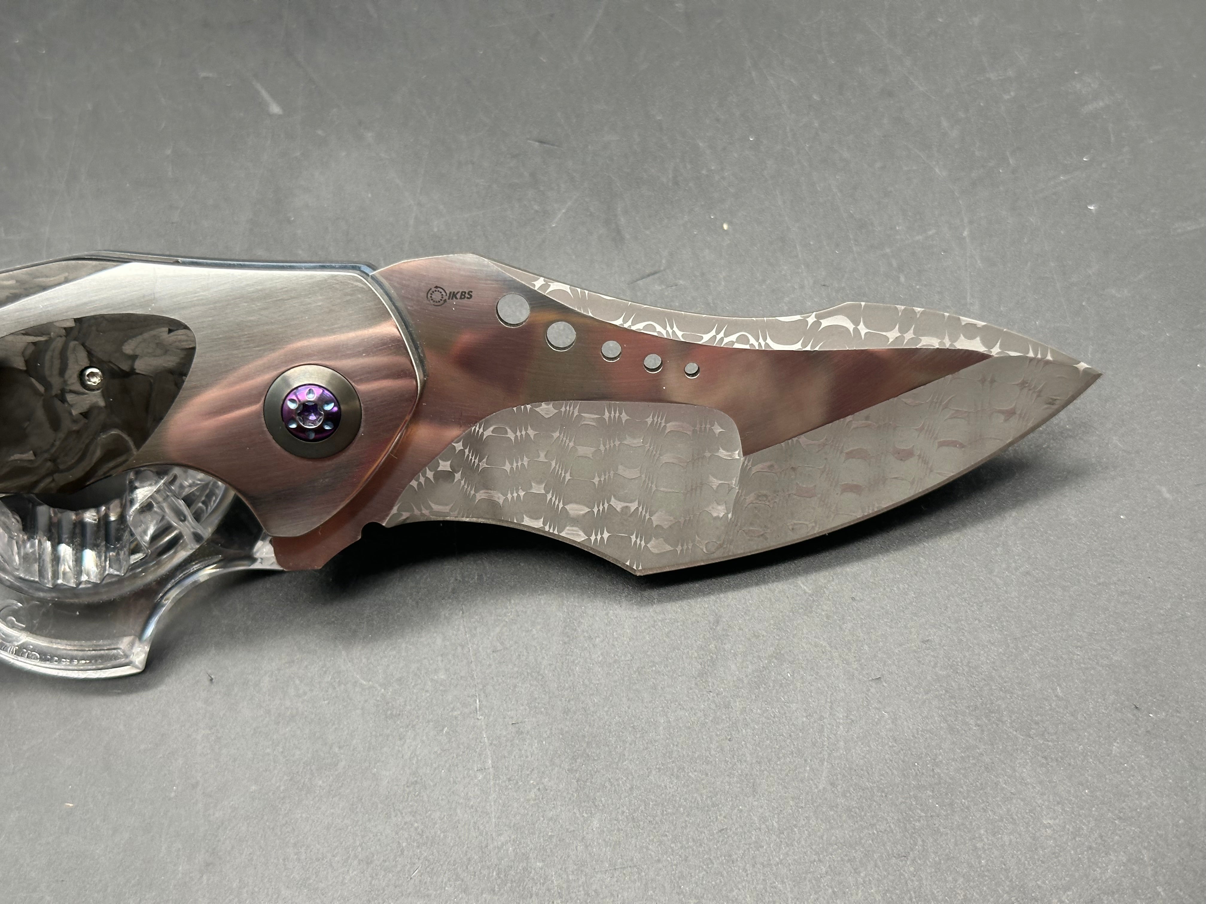 JD Vandeventer Sympatico: 3.75 inch Damascus blade with mirror polished flats. Handle with mirror polished titanium scales