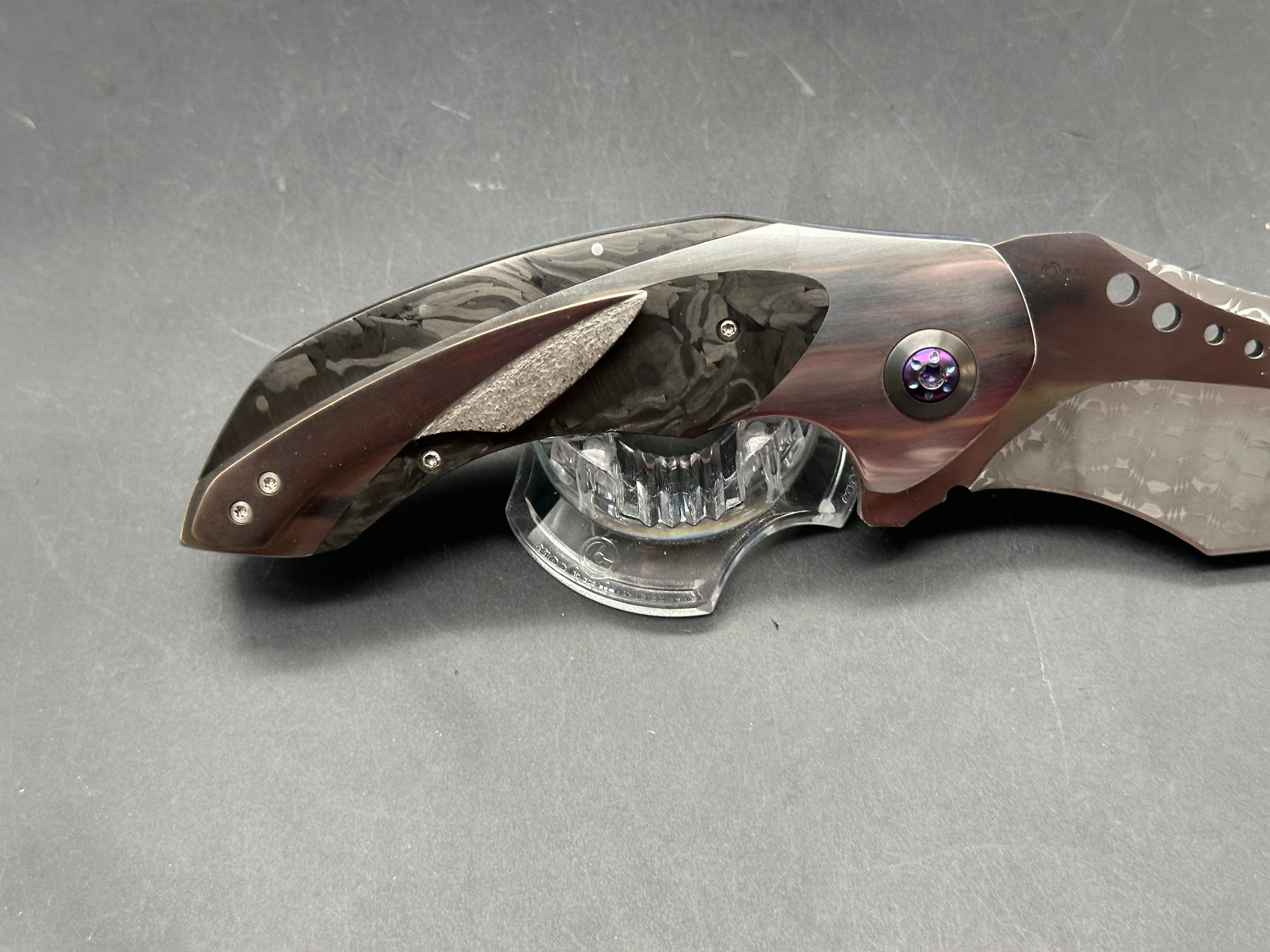 JD Vandeventer Sympatico: 3.75 inch Damascus blade with mirror polished flats. Handle with mirror polished titanium scales