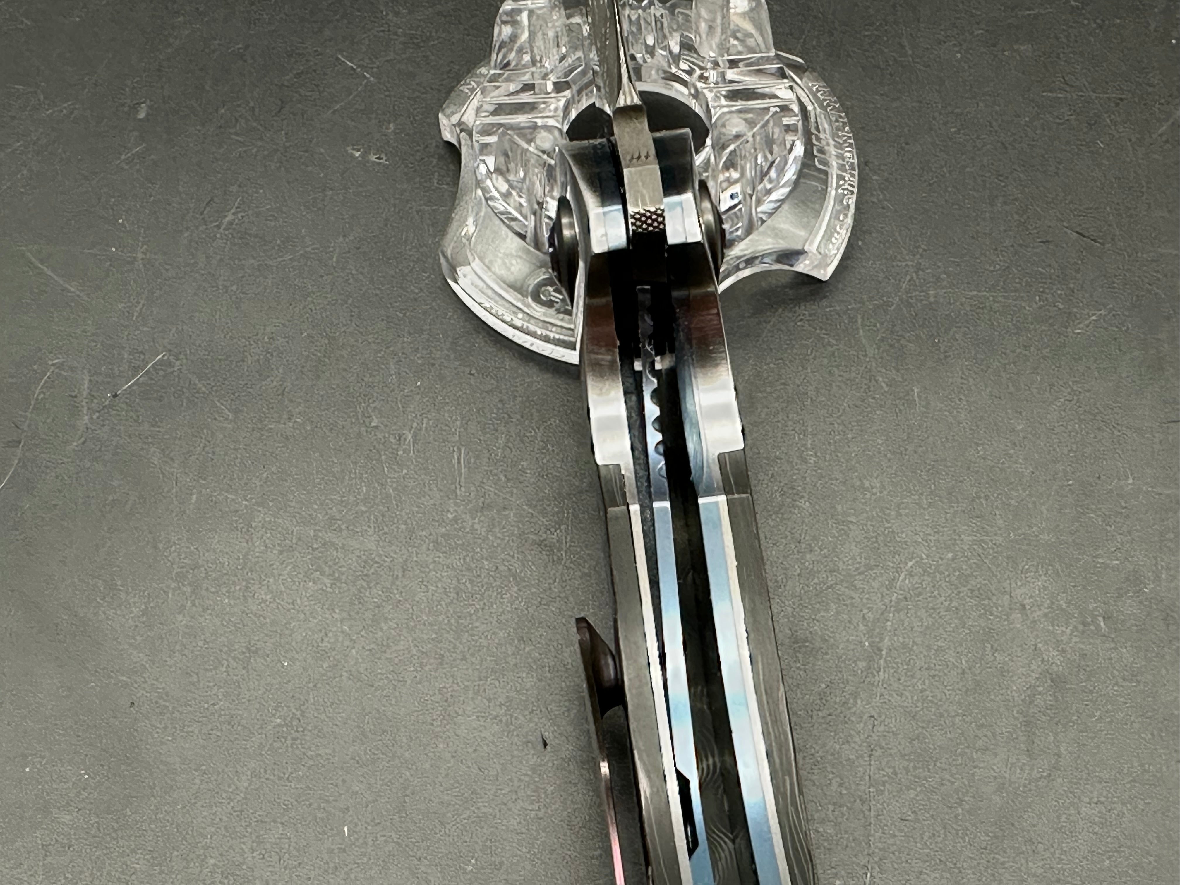 JD Vandeventer Sympatico: 3.75 inch Damascus blade with mirror polished flats. Handle with mirror polished titanium scales