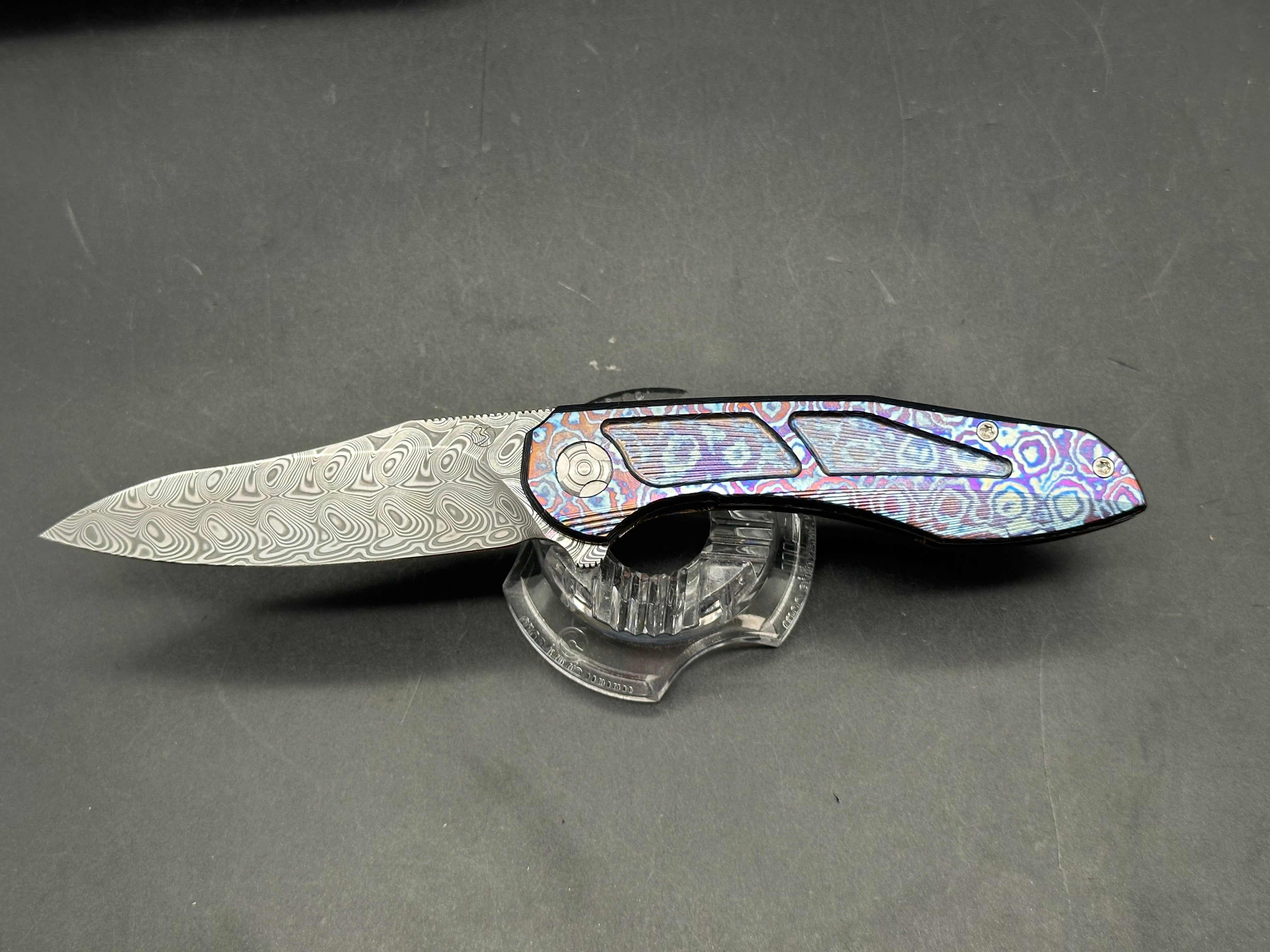 Brad Southard Mini Tolk Full Dress: 3.25 inch USA Damasteel blade. Mokuti scales with matching Mokuti backspacer and clip