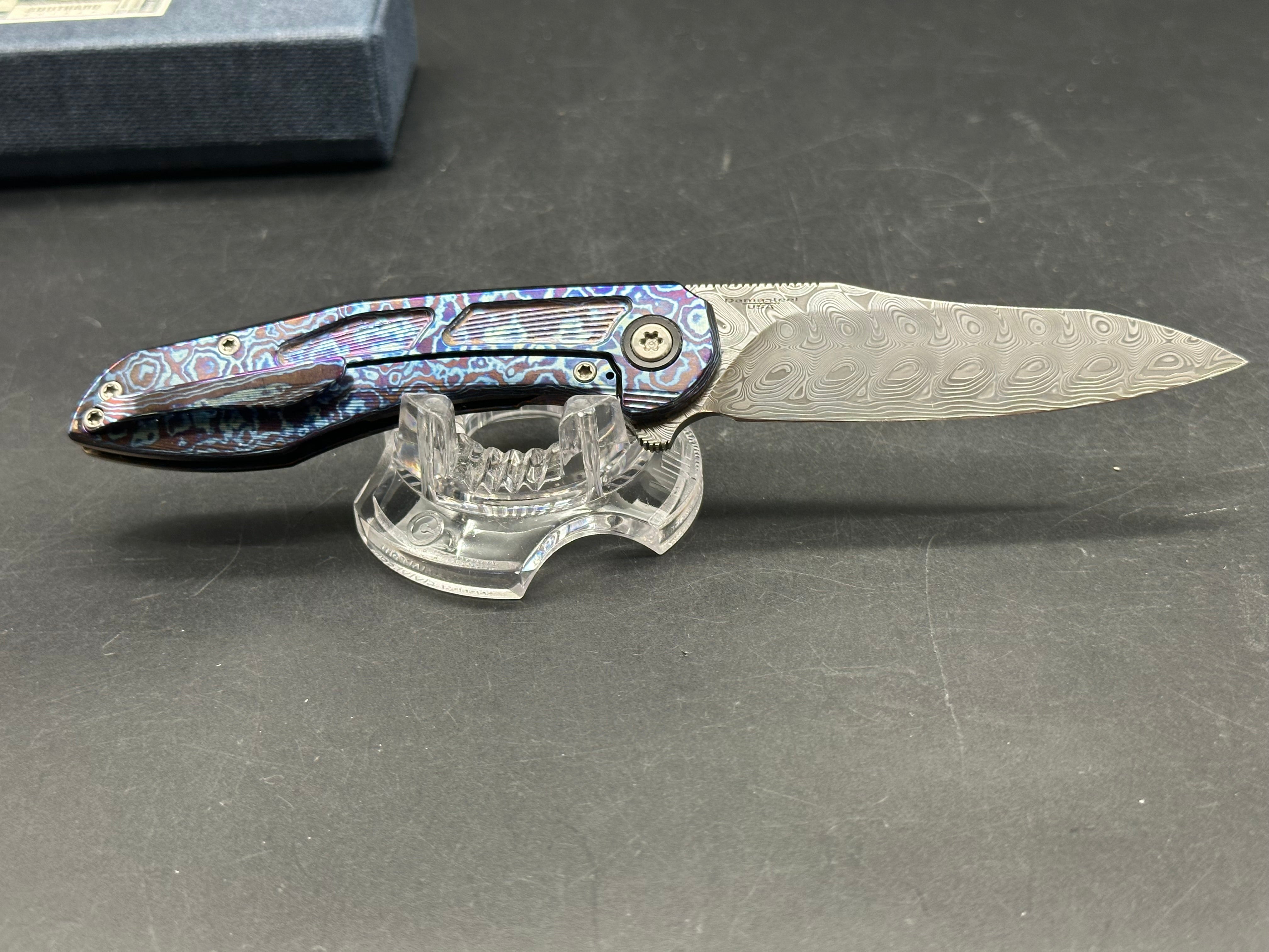 Brad Southard Mini Tolk Full Dress: 3.25 inch USA Damasteel blade. Mokuti scales with matching Mokuti backspacer and clip