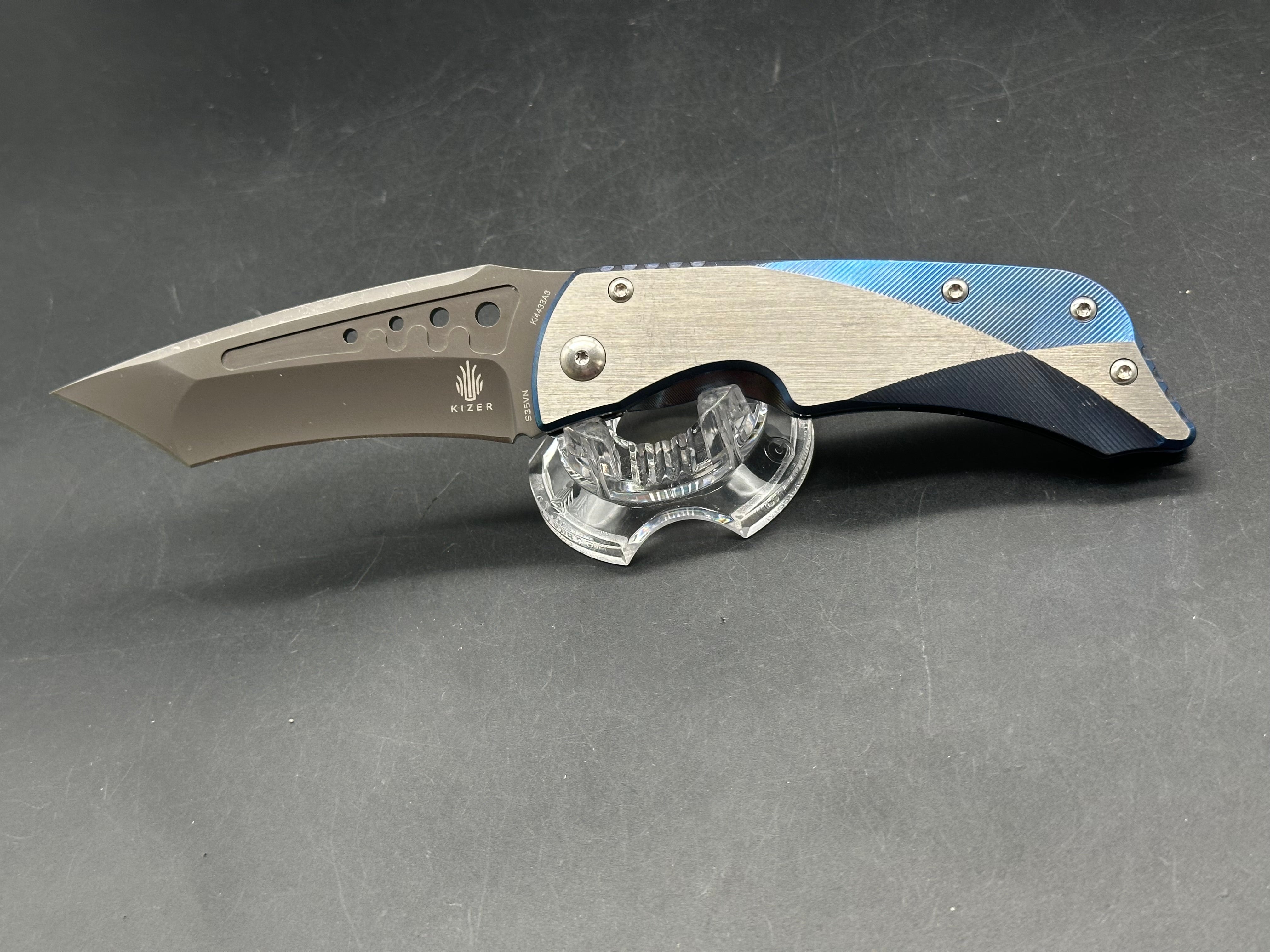 Kizer LGM: 4 inch titanium coated CPM-S35VN blade. Two tone anodized titanium frame