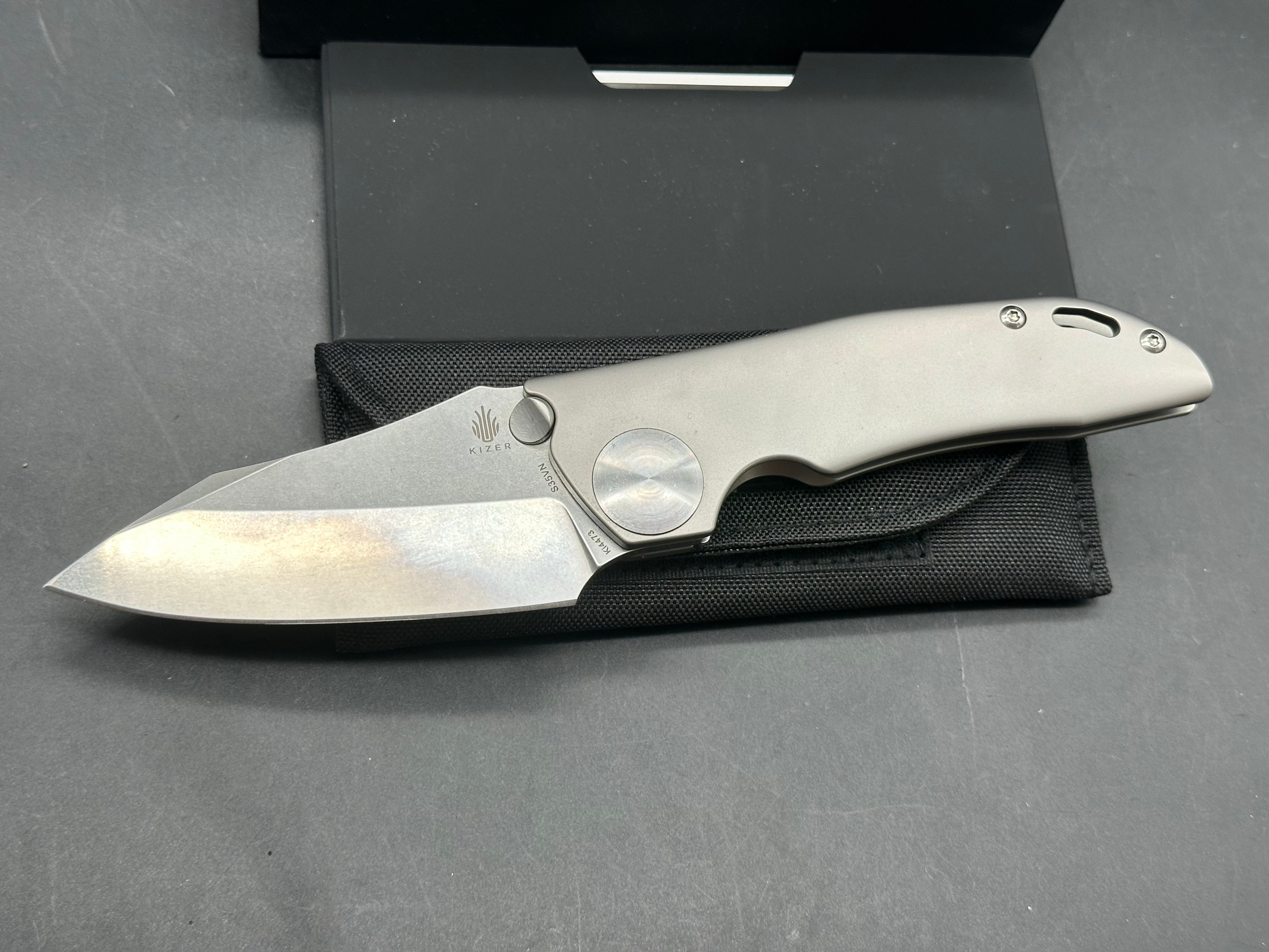 Kizer GPB1  / 3.625 inch tumbled finish CPM-S35VN blade. Bead blasted titanium frame with polished hardware