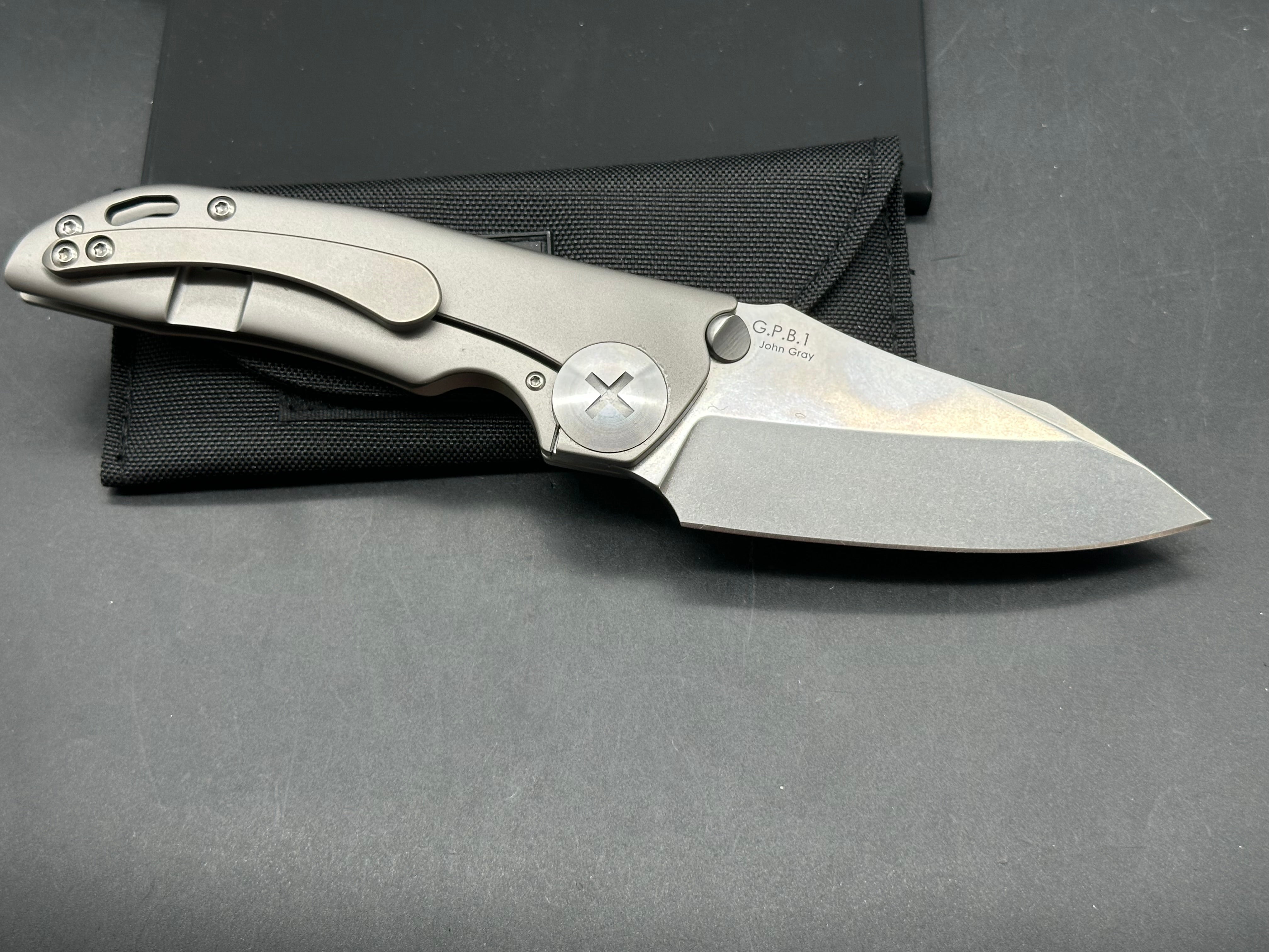 Kizer GPB1  / 3.625 inch tumbled finish CPM-S35VN blade. Bead blasted titanium frame with polished hardware