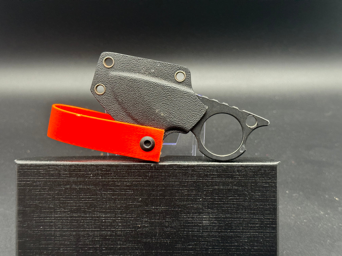 NC Custom Neck Knife. Black stone wash with orange belt loop