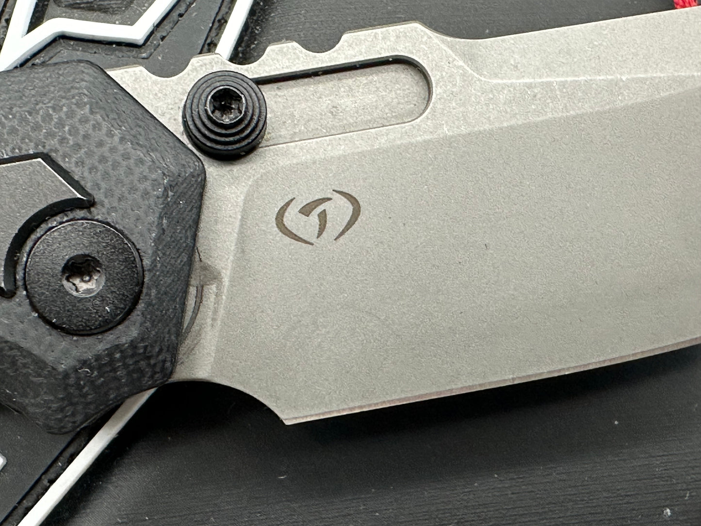 Arcane Preytheon black G10 handle w/titanium inserts w/extra jade G10 inserts included.