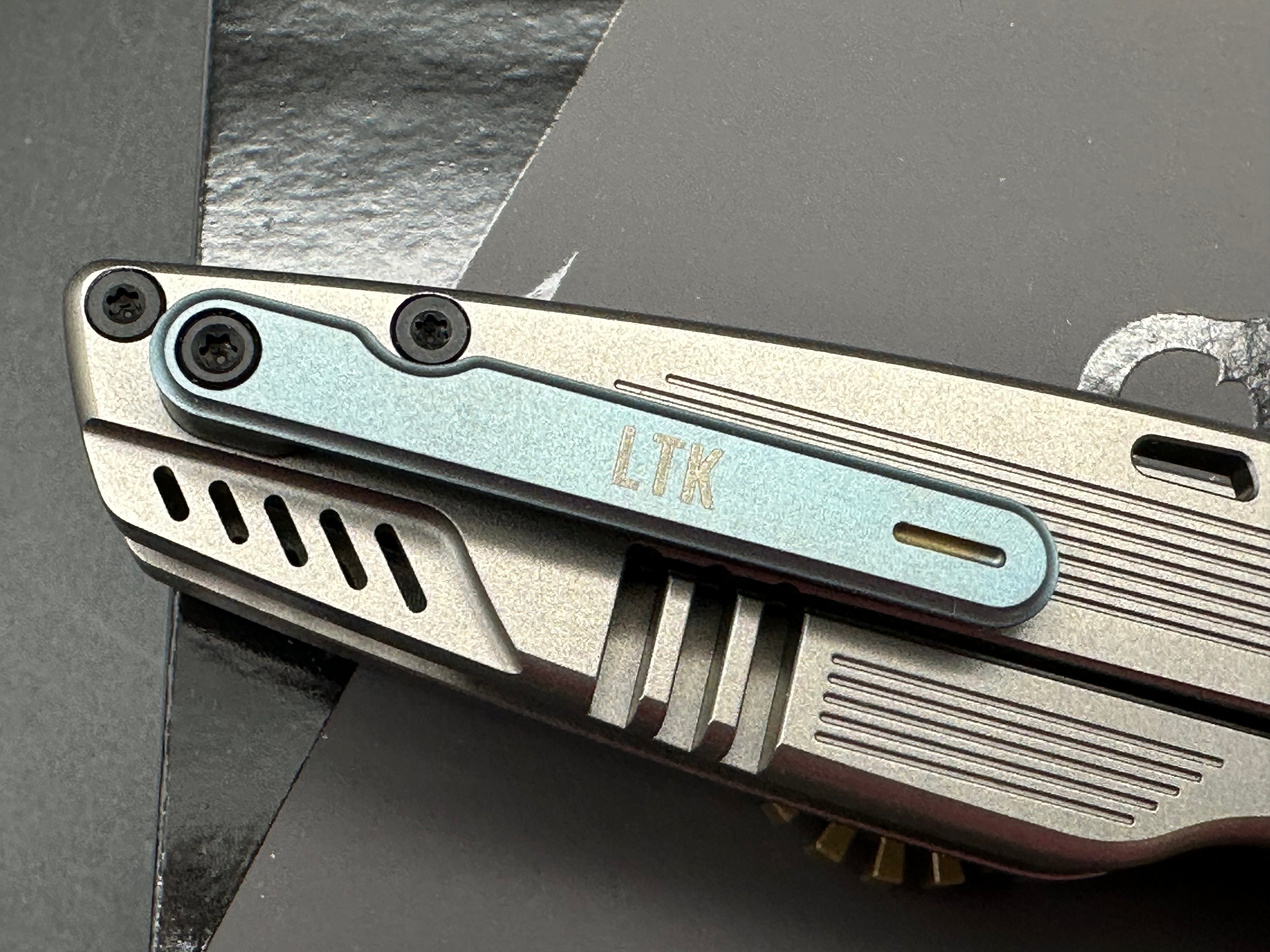 Spark fidget knife titanium handle w/M390 blade
