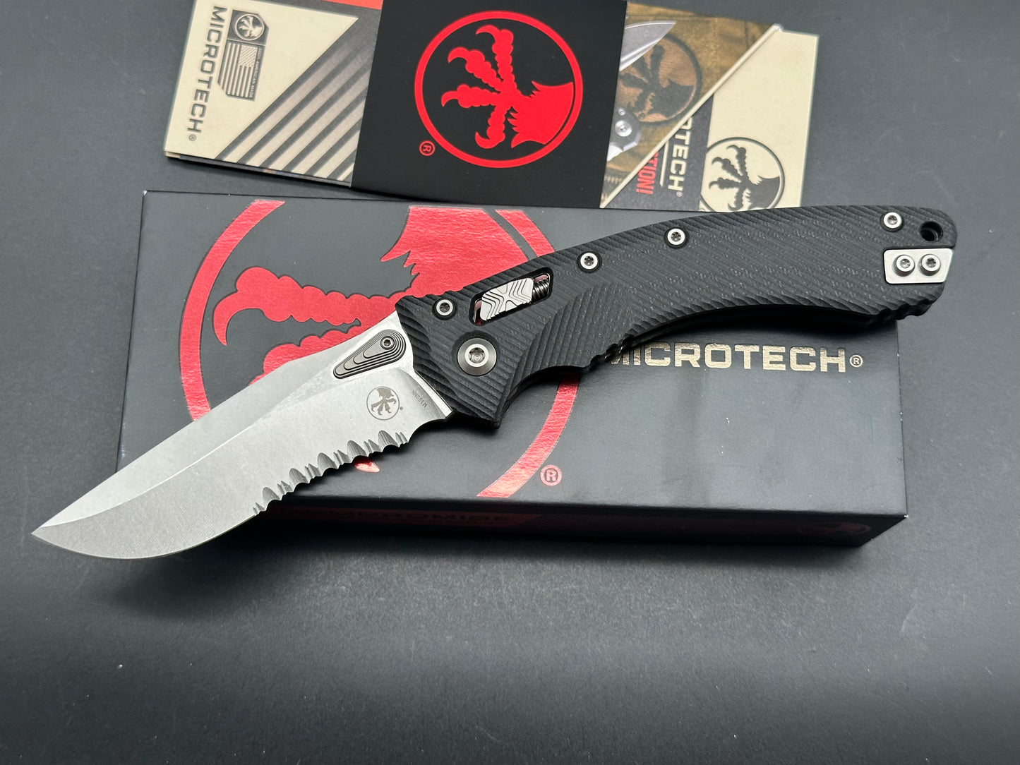 Microtech Amphibian Ram-Lok S/E Manual Knife Fluted Black G-10 (3.9" SW Serr)