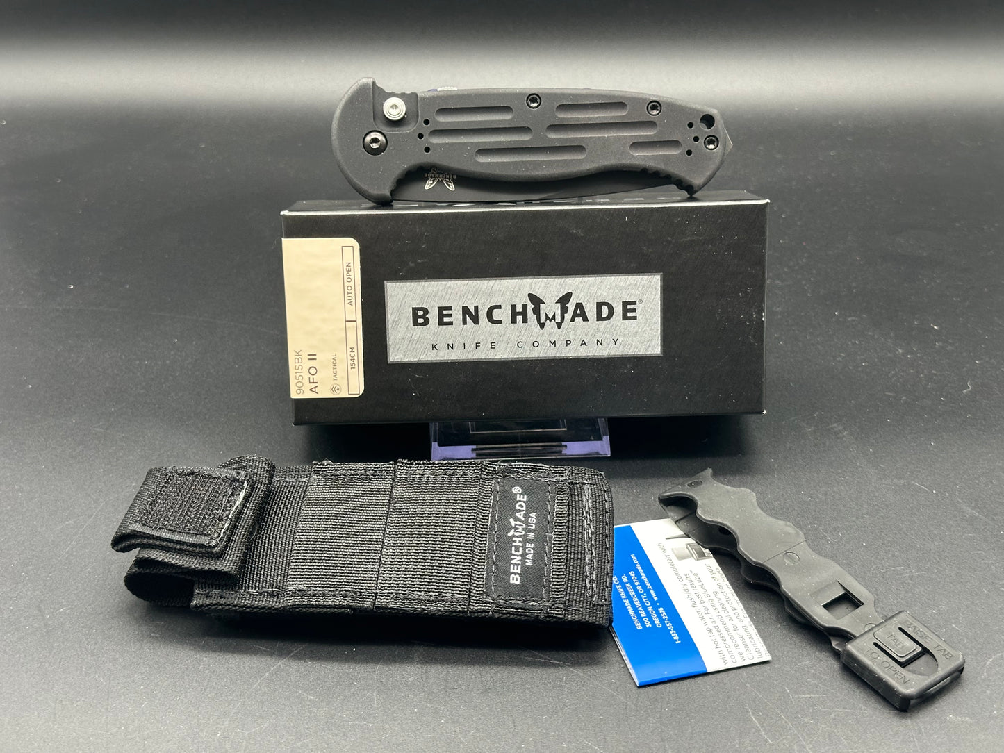 Benchmade 9051 AFO II black aluminum handle w/154CM partially serrated blade