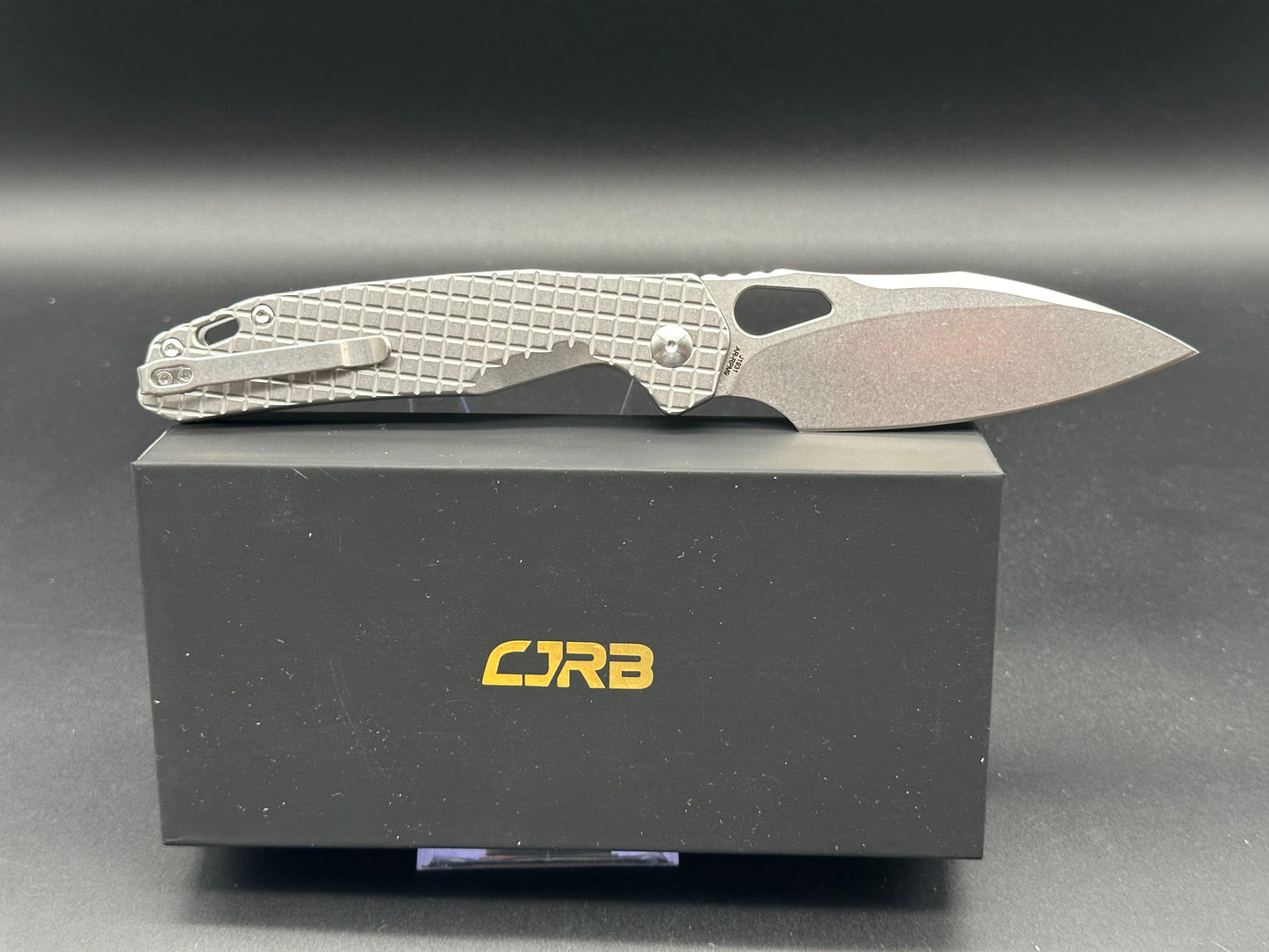 CJRB FRACK POCKET KNIFE FRAG STAINLESS HANDLE AR-RPM9 BLADE BUTTON LOCK J1931-FST