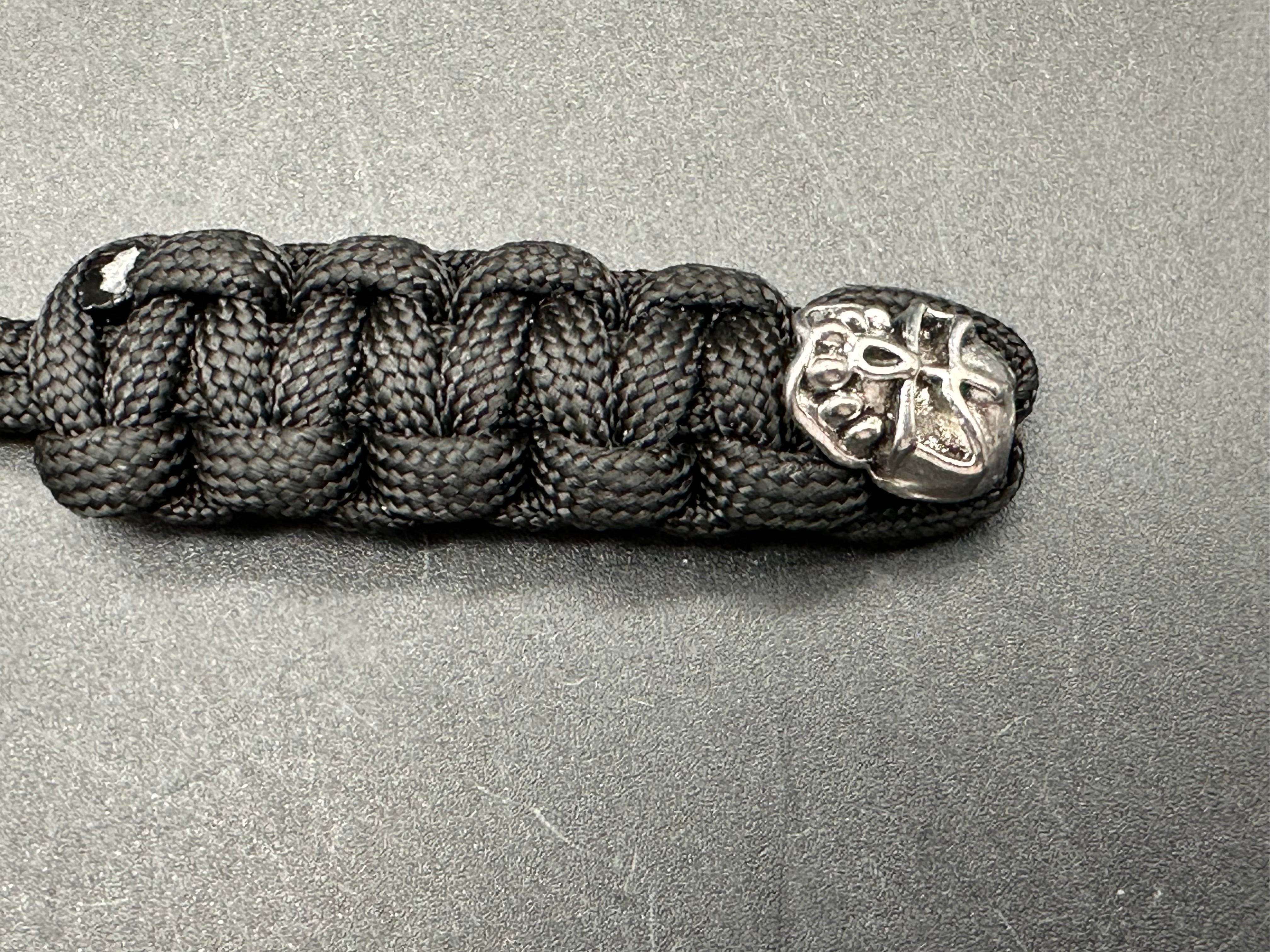 2 - paracord lanyards. Spyderco bead & skull bead