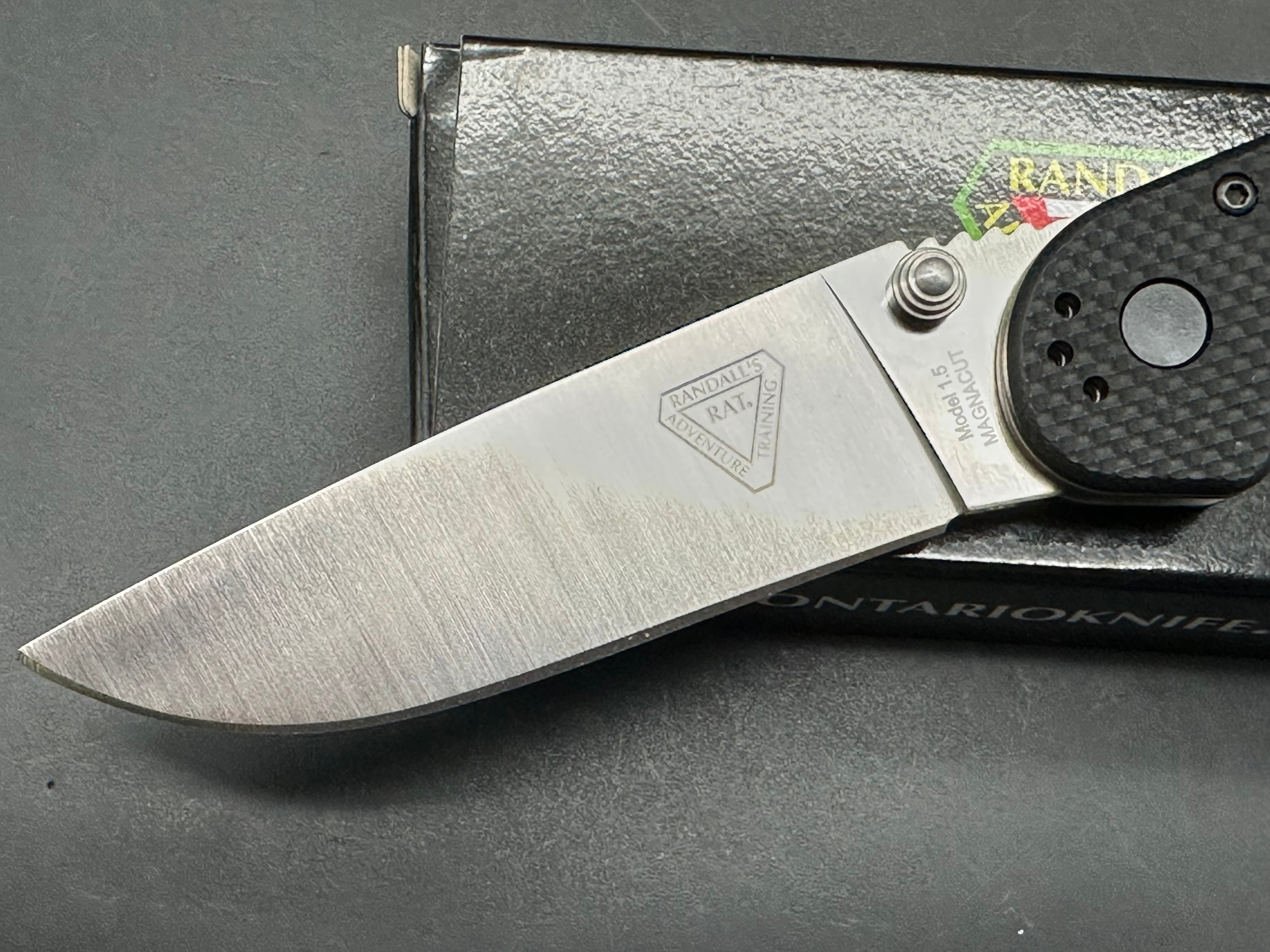 Ontario Rat 1.5 3.25" CPM MagnaCut Satin Blade with Black Textured G10 Scales