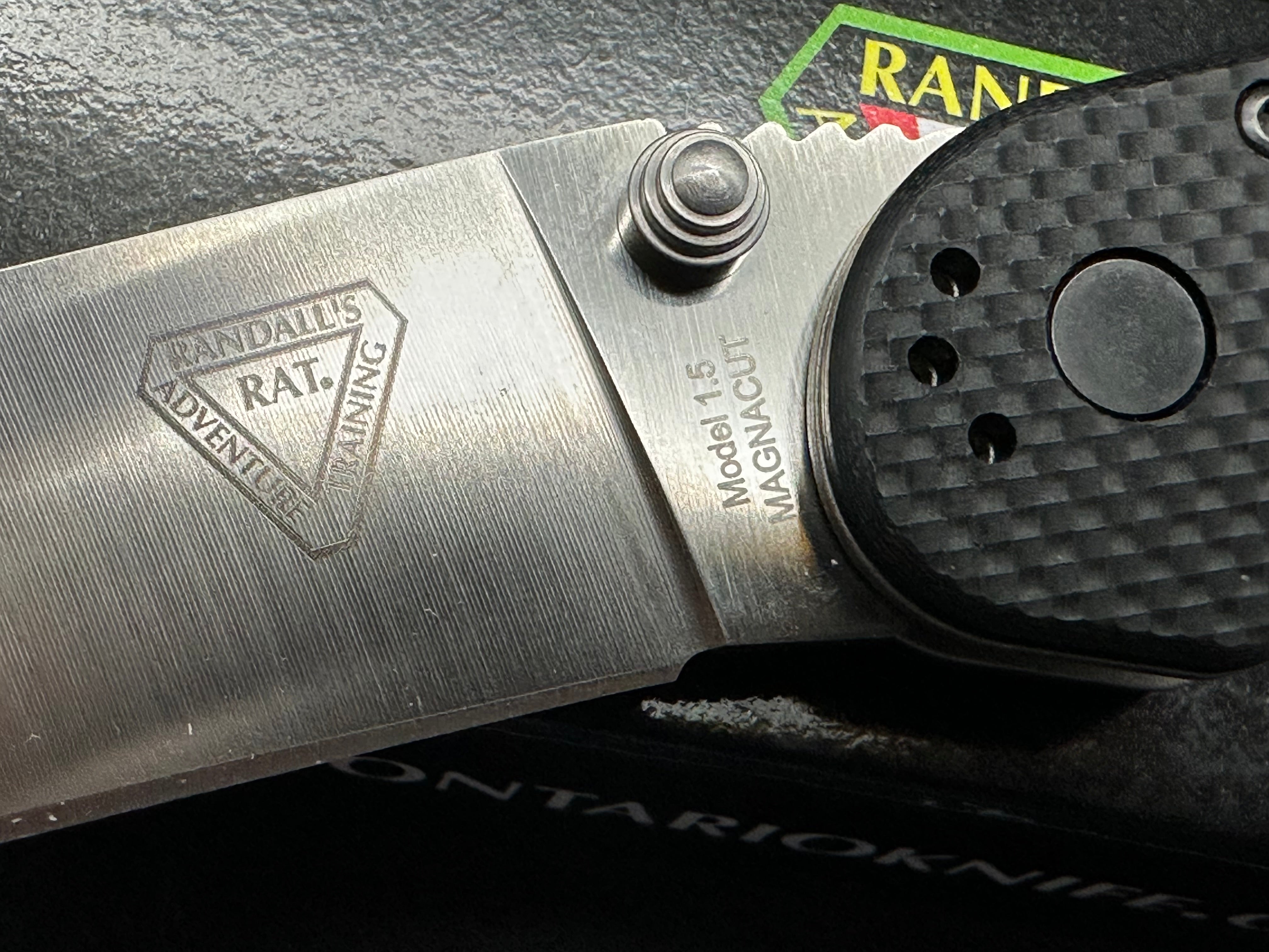 Ontario Rat 1.5 3.25" CPM MagnaCut Satin Blade with Black Textured G10 Scales