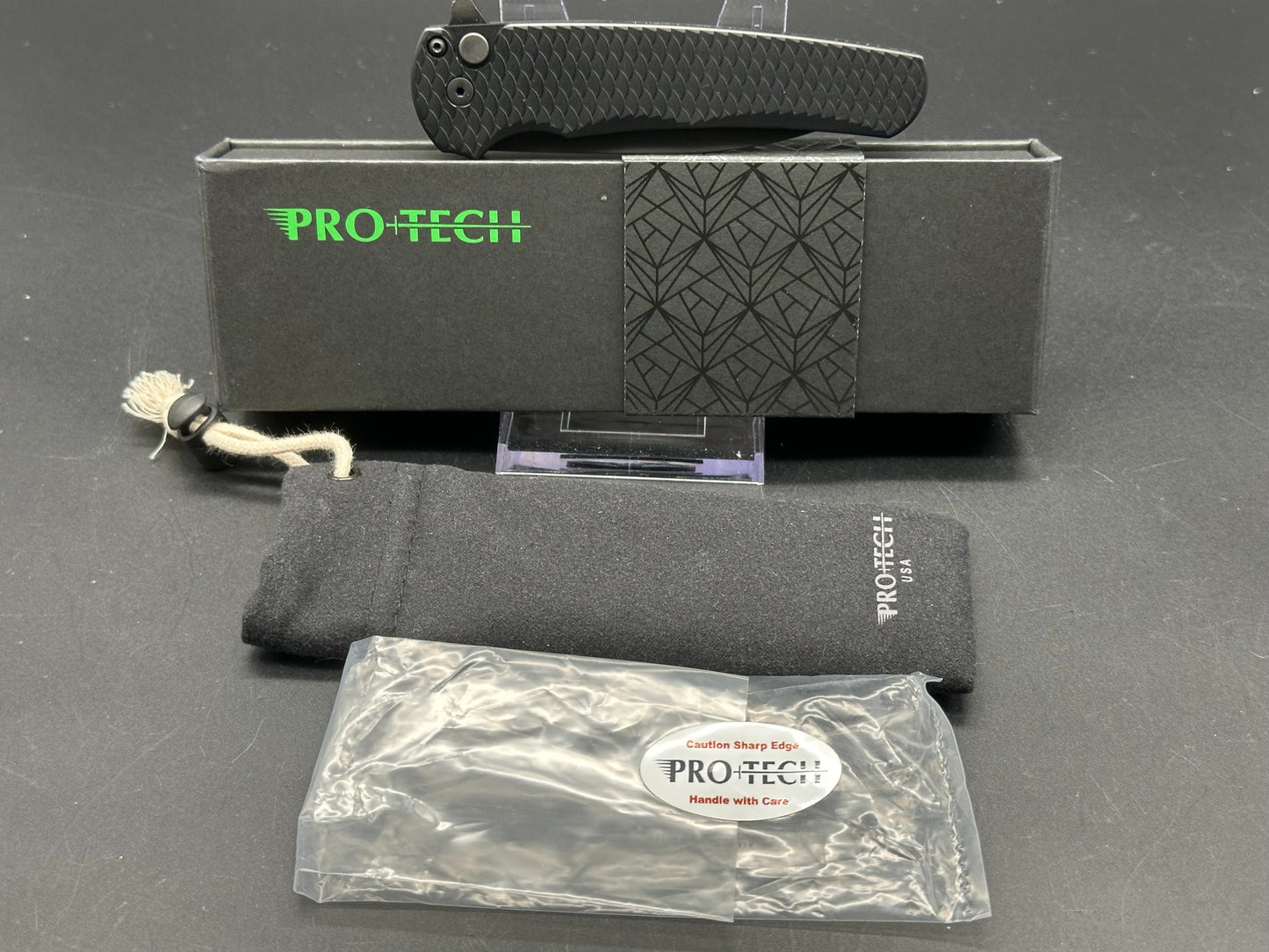 ProTech Malibu 3.3" Wharncliffe Plunge Lock Flipper / Black Dragon Scale Aluminum / Black DLC MagnaCut