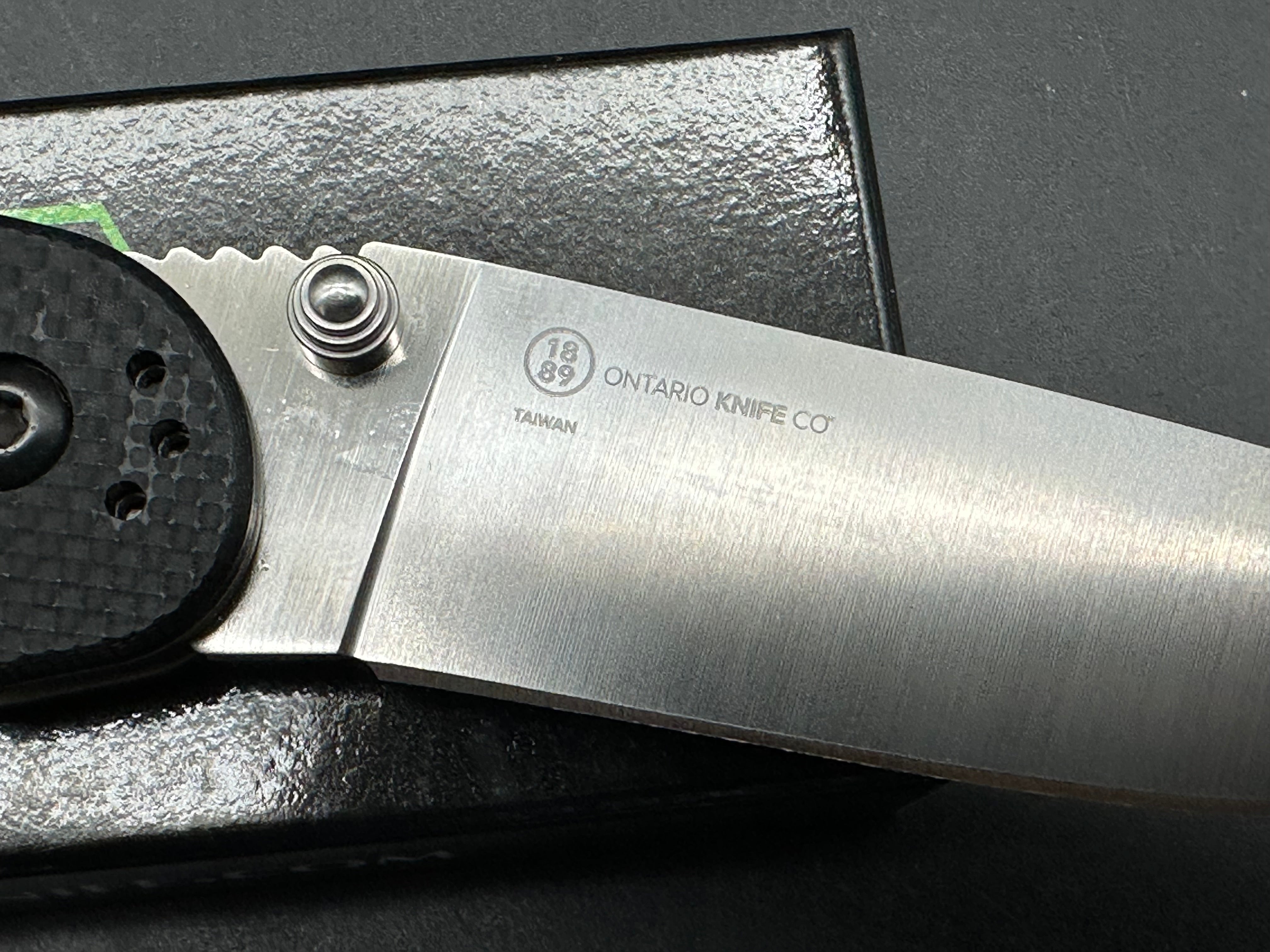 Ontario Rat 1.5 3.25" CPM MagnaCut Satin Blade with Black Textured G10 Scales
